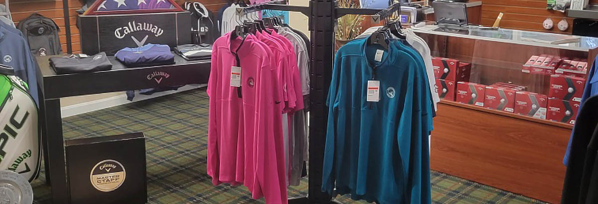 polo shirts and other merchandise inside the proshop